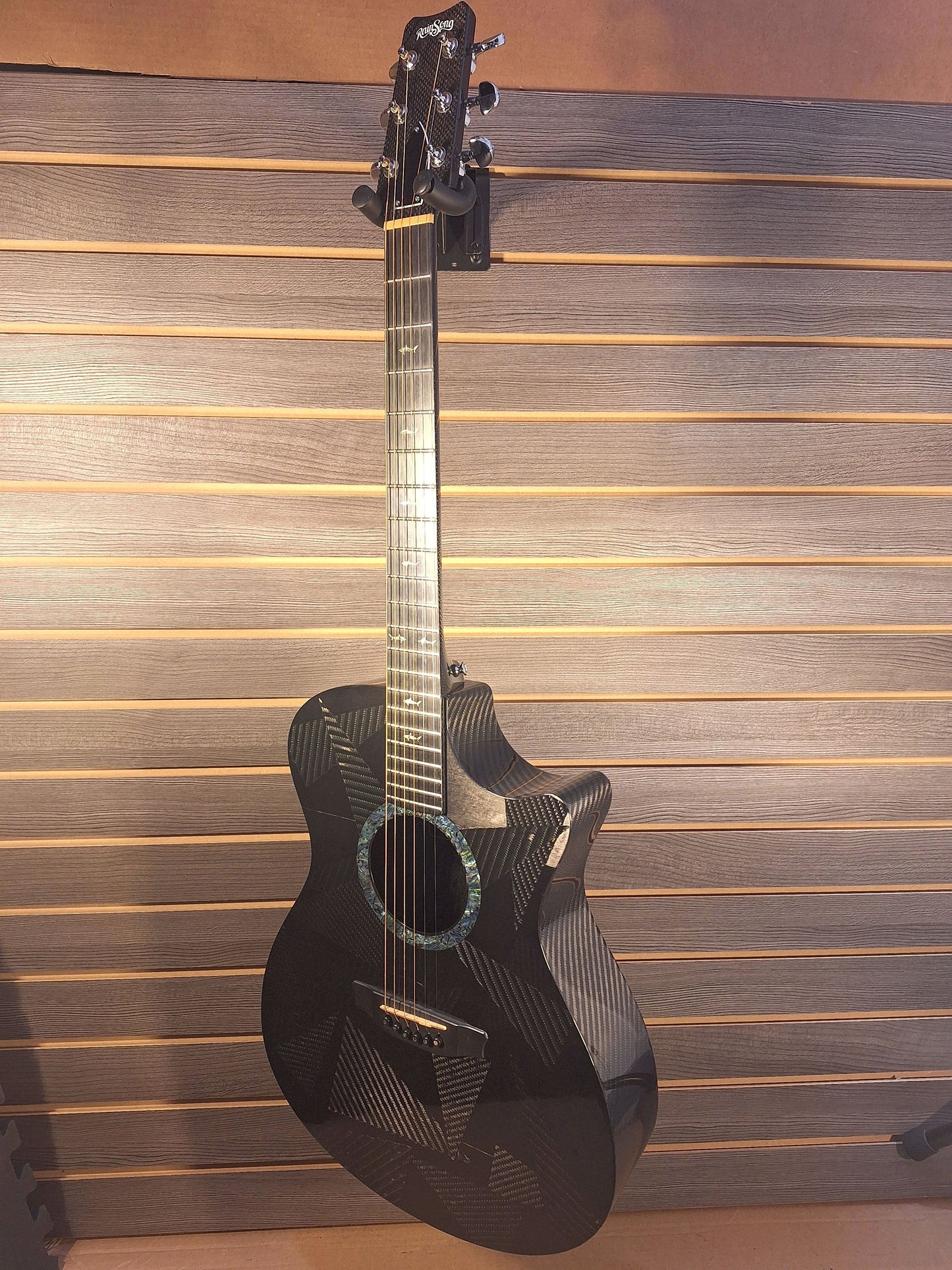 Previously Owned Rainsong BI-OM1000N2 with Iriginal Hard Case